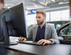 An automotive employee dealing with a cybersecurity issue