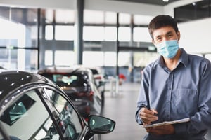 Employee wearing mask