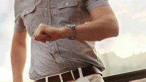 Man looking at watch